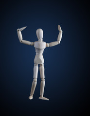 Wooden figurine flexing muscles in bodybuilder pose on dark background