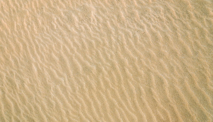 White and yellow sand in the desert beach