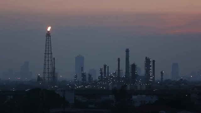 Petrochemical Oil refinery industry with city background