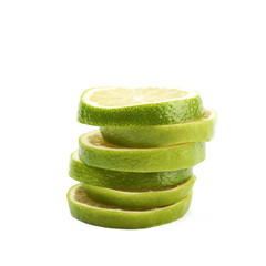 Pile of multiple lime slices isolated