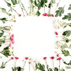 Wreath frame of red and white wildflowers, green leaves, branches on white background. Flat lay, top view. Valentine's background