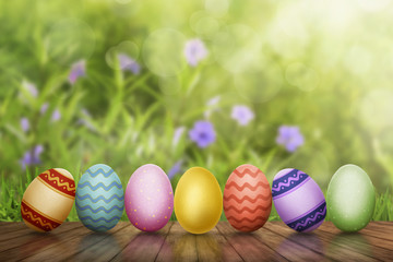 Fototapeta na wymiar Row of Easter eggs on wooden table
