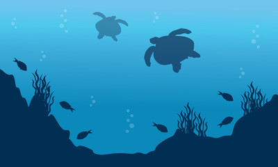Landscape of fish and turtle silhouettes