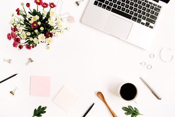 Top view home office table desk frame. Workspace with laptop, wildflowers bouquet, coffee cup,...