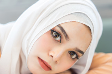 Fashion portrait  beautiful muslim woman with the white  hijab