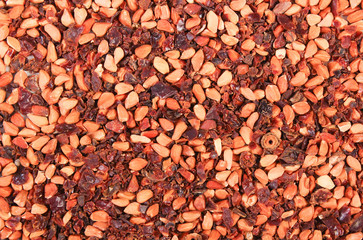 Dried wild rose tea grains as background