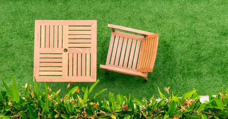 top view wood table and chair table on grass