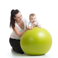Fototapeta na wymiar kid and mother with fitness ball isolated