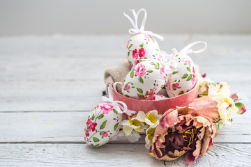 Easter composition with eggs in a bowl