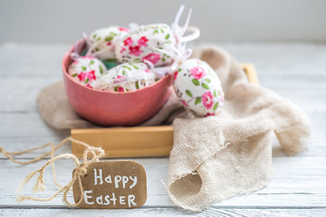 Easter composition with eggs in a bowl