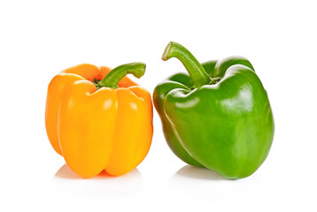 yellow and green bell peppers (capsicum) on a white background