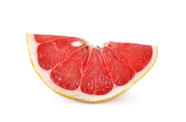 Red pomelo slice on white background