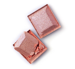 Beige crashed eyeshadow for makeup as sample of cosmetic product