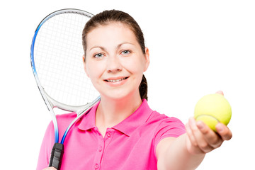 Portrait of a young girl playing tennis on a white background isolated