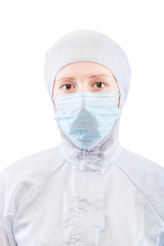 Vertical portrait of a biochemist in a protective suit on a white background isolated