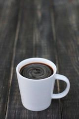 Hot coffee black coffee on black background
