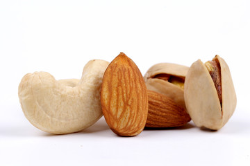 Assorted nuts, dry fruits, mix nuts, almond, walnut, pistachio, cashew, raisin, berry