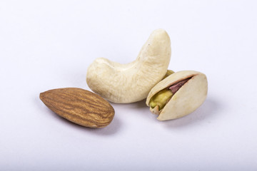 Assorted nuts, dry fruits, mix nuts, almond, walnut, pistachio, cashew, raisin, berry