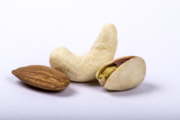 Assorted nuts, dry fruits, mix nuts, almond, walnut, pistachio, cashew, raisin, berry