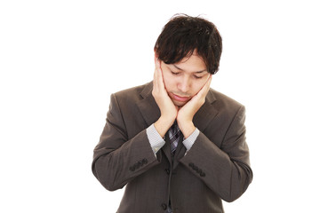 苦悩するビジネスマン
