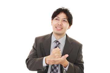 ガッツポーズのビジネスマン
