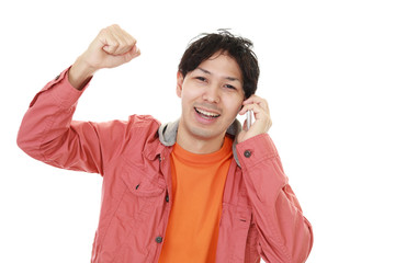 Fototapeta premium ガッツポーズの男性 