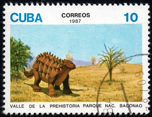 UKRAINE - CIRCA 2017: A stamp printed in Cuba, shows a extinct animals from the park of dinosaurs...