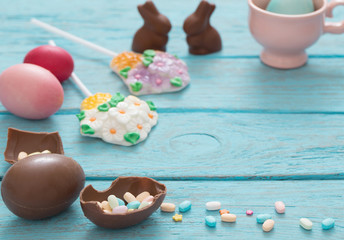 Easter Eggs Over Blue Wooden Background