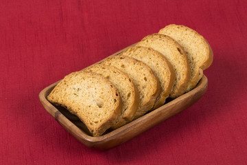 rusk with cardamom flavor, rusk on jute, rusk on cloth, rusk