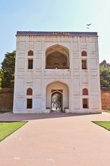 Fototapeta premium One of the entrance of the Mughal Emperor Humayun's tomb. The tomb was commissioned by his wife Bega Begum in 1569-70. Many Mughal rulers lie buried here.