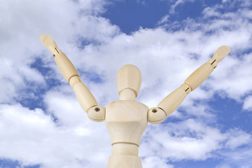 Wooden figure concepts,and blue sky background