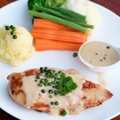 Grilled chicken steak  on the table