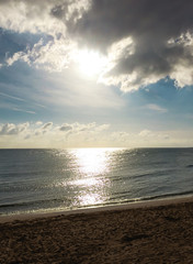 The sun shines through the clouds sea. Mobile photo