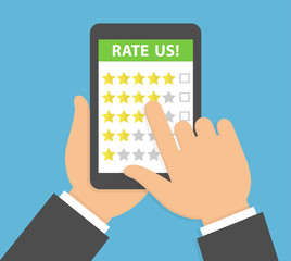 Online feedback rating and review concept. Hand holding and pointing to tablet with five star rating system on the screen. Vector illustration in flat style