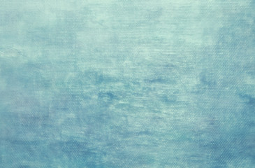 Abstract light blue oil paint background with brush strokes on canvas.