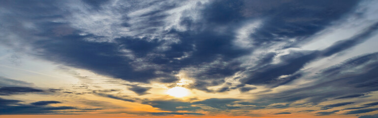 dark dramatic clouds at sunset. sky background panorama