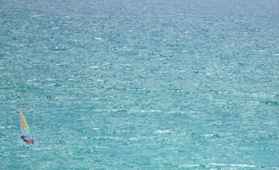Windsurfer alone at open sea
