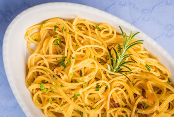 White plate with spaghetti and seafood