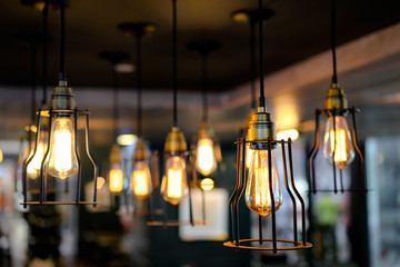 Light, design and interior. Vintage metallic lanterns.