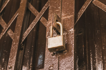 Old rusty lock on the door , close-up