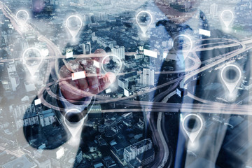 Double exposure of map pin in cityscape and network connection. Connection concept.