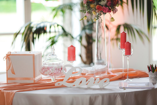 Decor wedding on the background of flowers, candle