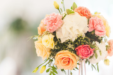 Bouquet of flowers in a vase at the wedding table