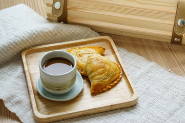 Dumplings baked custard filling on wooden Plate