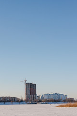 Winter landscape on a frozen river