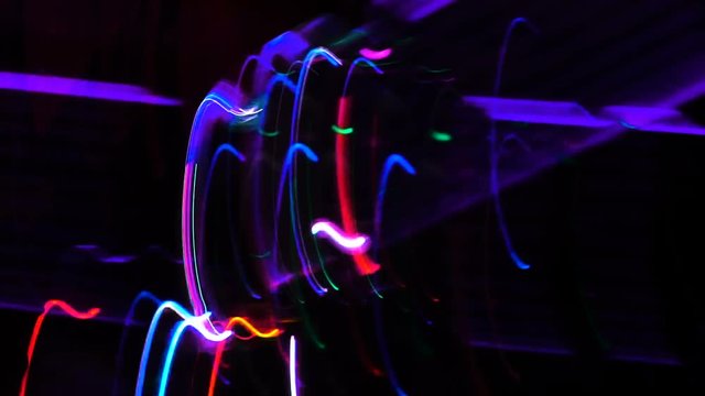 Timelapse of random glowing defocused lights at the party