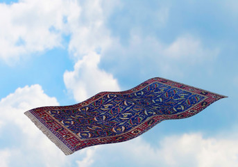 Surrealistic flying carpet against blue sky and white clouds. 3D rendering