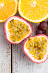 oranges and passion fruit, red grapes
