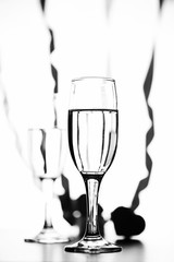 monochrome photo of champagne on white table on white background isolate
