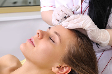 Fototapeta premium Mesotherapy injections in the face.